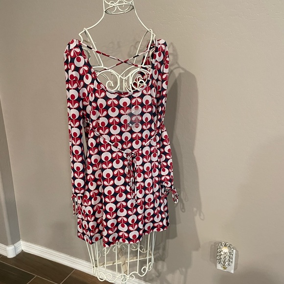 Two blouses identical pattern. Four buttons down the front. - Picture 2 of 7